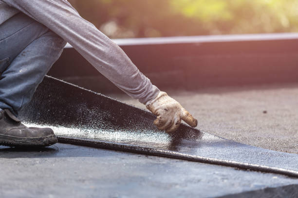 Professional Waterproofing technician working in Homer, MI